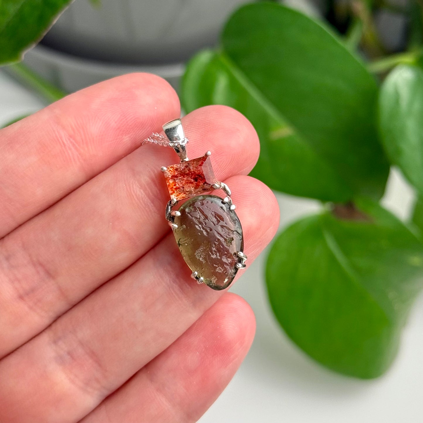 Polished Moldavite & Sunstone Pendant—3.16 Grams